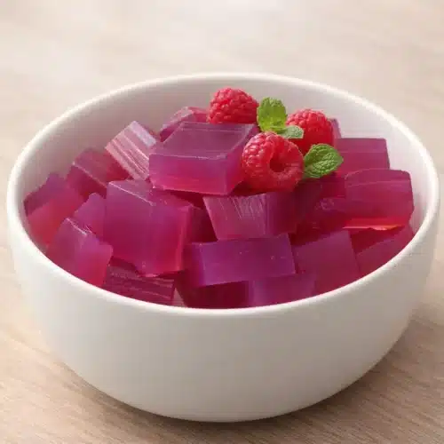 pink gelatin trick recipe chilled pink gelatin cubes served in a bowl
